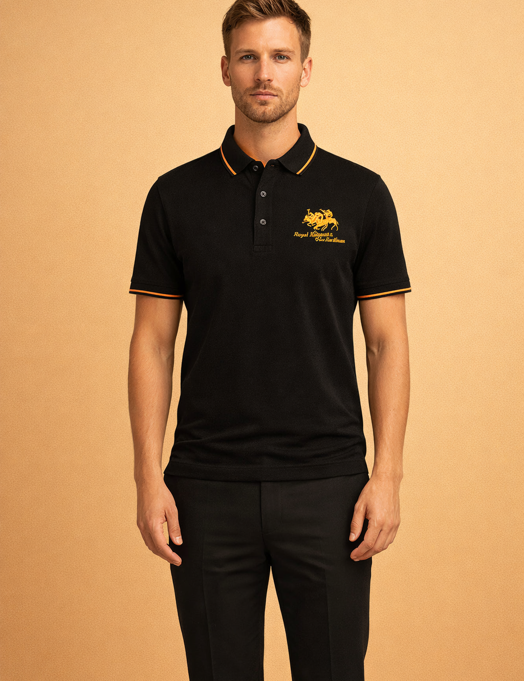Black short-sleeve polo shirt with structured collar, contrast gold piping along the collar edge, embroidered gold crest on the chest, tonal button placket, and smooth solid fabric finish.
