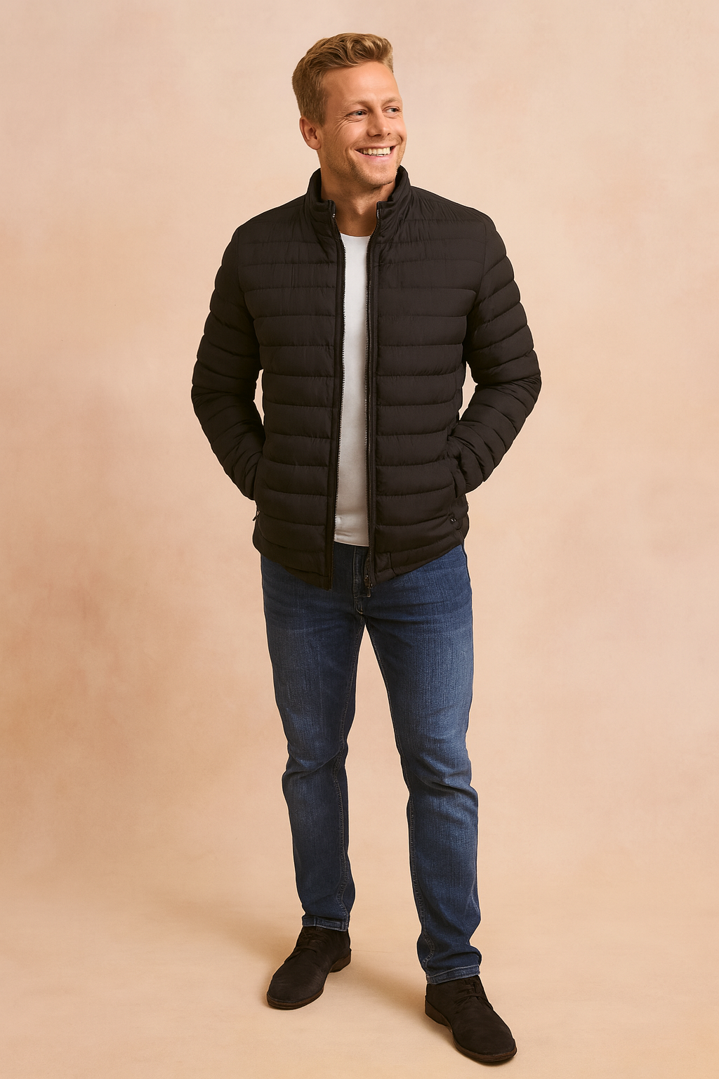 Black quilted puffer jacket with front zipper closure, horizontal stitched padding, and elastic cuffs, styled with a white crewneck T-shirt, blue slim-fit jeans, and black suede shoes.