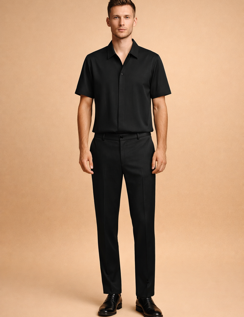Black short-sleeve button-up shirt paired with matching tailored trousers and sleek black leather dress shoes, featuring a smooth matte fabric finish, clean seam construction, straight-leg cut, and a minimalist modern silhouette with precise drape and uniform deep-black color tone.