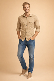 Slim-fit black long-sleeve button-up shirt with dual chest flap pockets, matte fabric finish, and straight hem, paired with mid-blue slim jeans featuring a clean wash and classic five-pocket construction, styled with low-profile white leather sneakers.