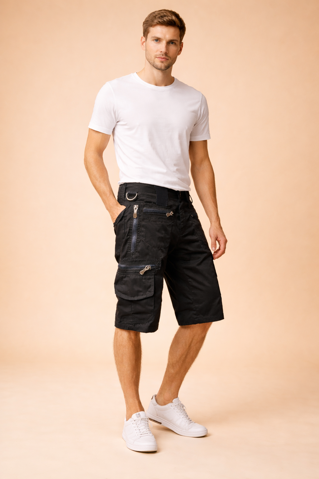 Black tactical cargo shorts with a structured straight-leg cut, durable matte fabric, multiple utility pockets including layered zippered thigh pockets and flap cargo pocket, reinforced stitching, belt loops, metal D-ring detail, and knee-length hem in a solid deep black tone with uniform texture and finish.
