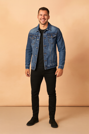 Blue denim jacket with button closure, flap chest pockets, and subtle fading, styled in a casual slim fit.