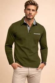 Blue long-sleeve polo shirt with a clean polo collar, subtle checkered inner placket and chest pocket trim, tailored slim fit, paired with light beige straight-leg trousers for a refined casual look.
