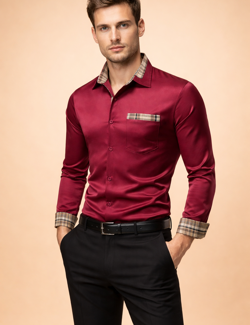 Burgundy satin long-sleeve button-up shirt with contrast plaid trim on collar and cuffs, chest pocket detail, paired with tailored black trousers and belt