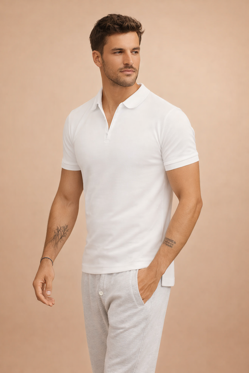 Classic short-sleeve polo shirt with a clean collar, two-button placket, and tailored slim fit, styled with straight-leg drawstring trousers for a refined casual look.
