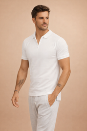 Classic short-sleeve polo shirt with a clean collar, two-button placket, and tailored slim fit, styled with straight-leg drawstring trousers for a refined casual look.