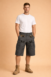 Dark gray tactical cargo shorts made from durable ripstop fabric with a fine grid weave, featuring reinforced seams, multiple utility pockets, flap cargo pockets, integrated tool compartments, metal zipper details, and a structured straight-leg cut, paired with a solid charcoal short-sleeve cotton T-shirt with a smooth matte finish.