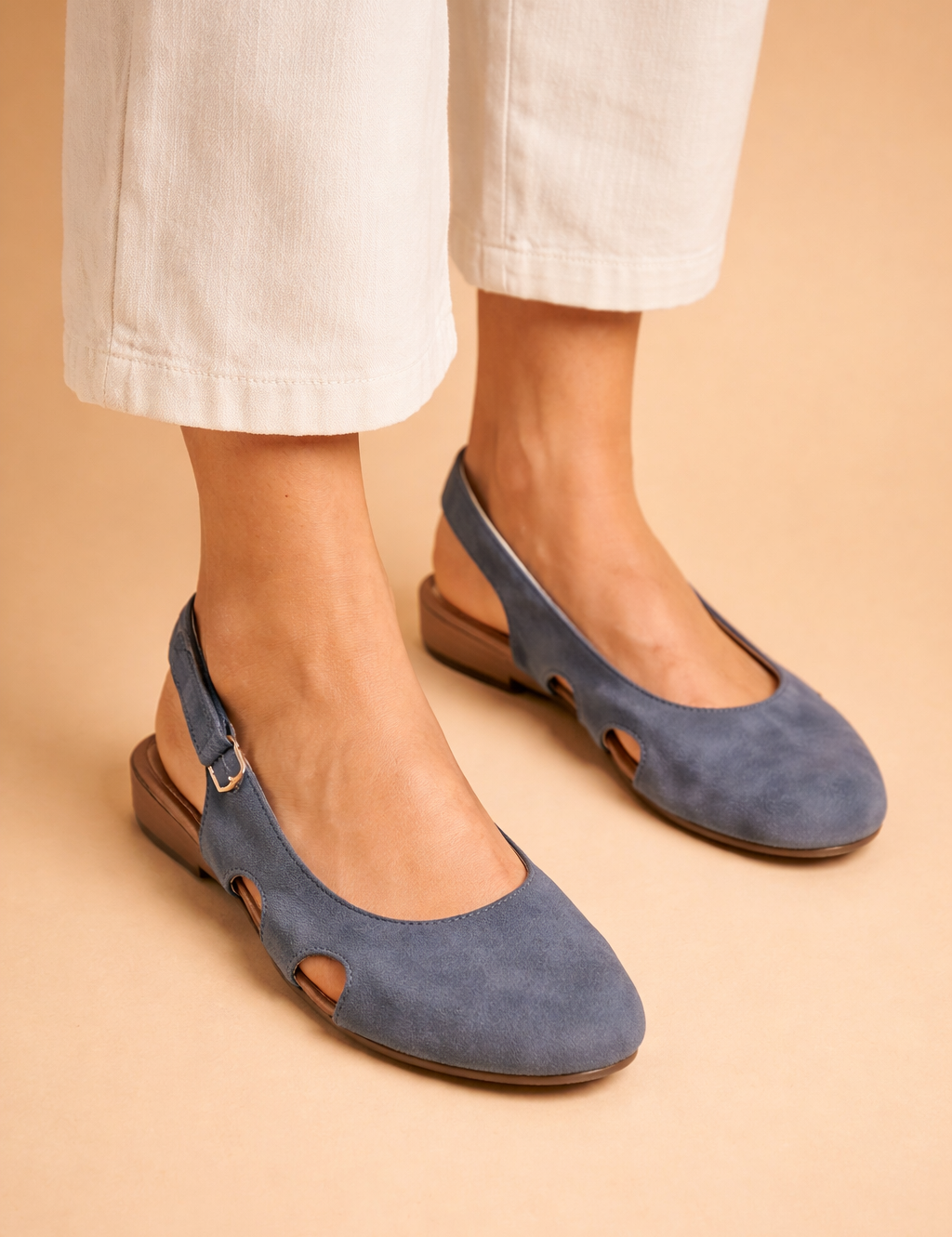 elegant-female-model-wearing-blue-suede-slingback-flats-studio-fashion-shot_a9c371ee-876b-46c9-94dd-5c320e995959.png