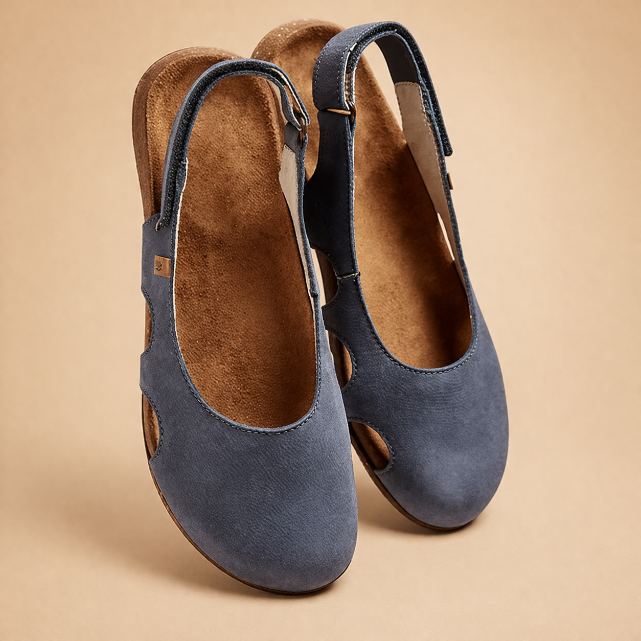 elegant-model-wearing-blue-suede-slingback-flats-studio-fashion-shot_b2d6120a-f075-426f-9cbe-e52c51c36bee.png