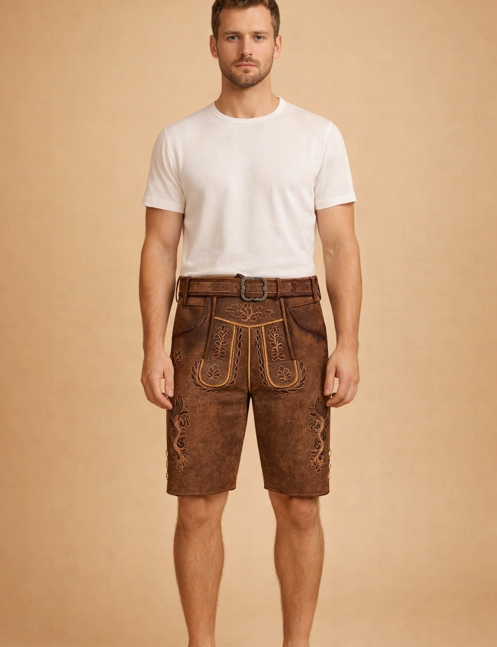 Traditional embroidered leather lederhosen shorts with decorative front flap, detailed alpine embroidery, side button accents, and matching belt with ornate buckle