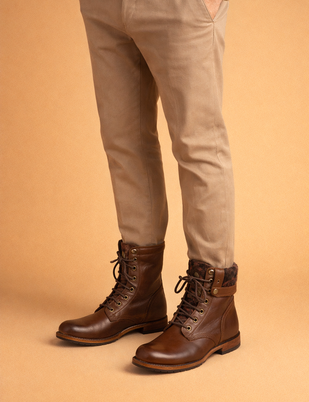 european-studio-model-wearing-brown-leather-boots-clean-sand-background.png