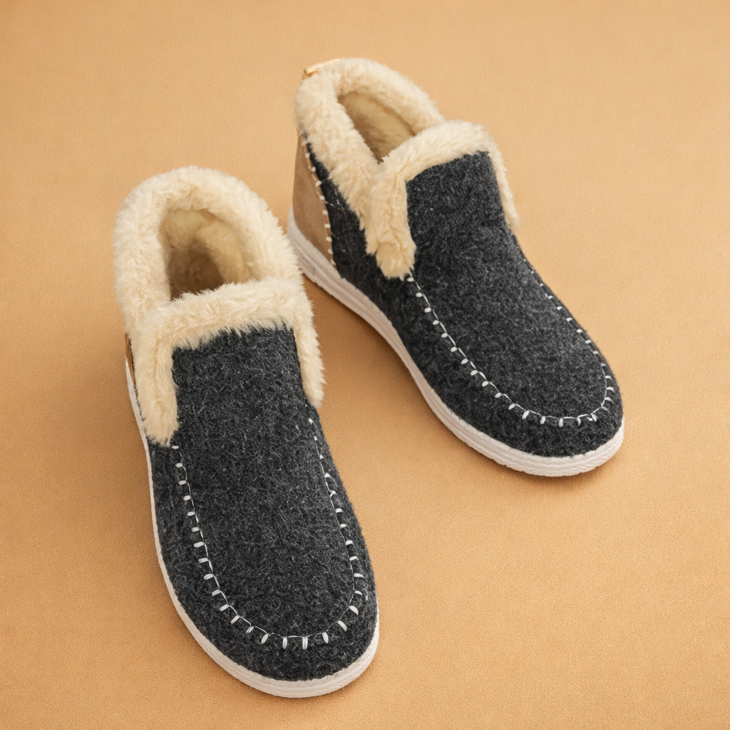 european-studio-model-wearing-charcoal-fleece-lined-slip-on-shoes-warm-sand-backgroun.png