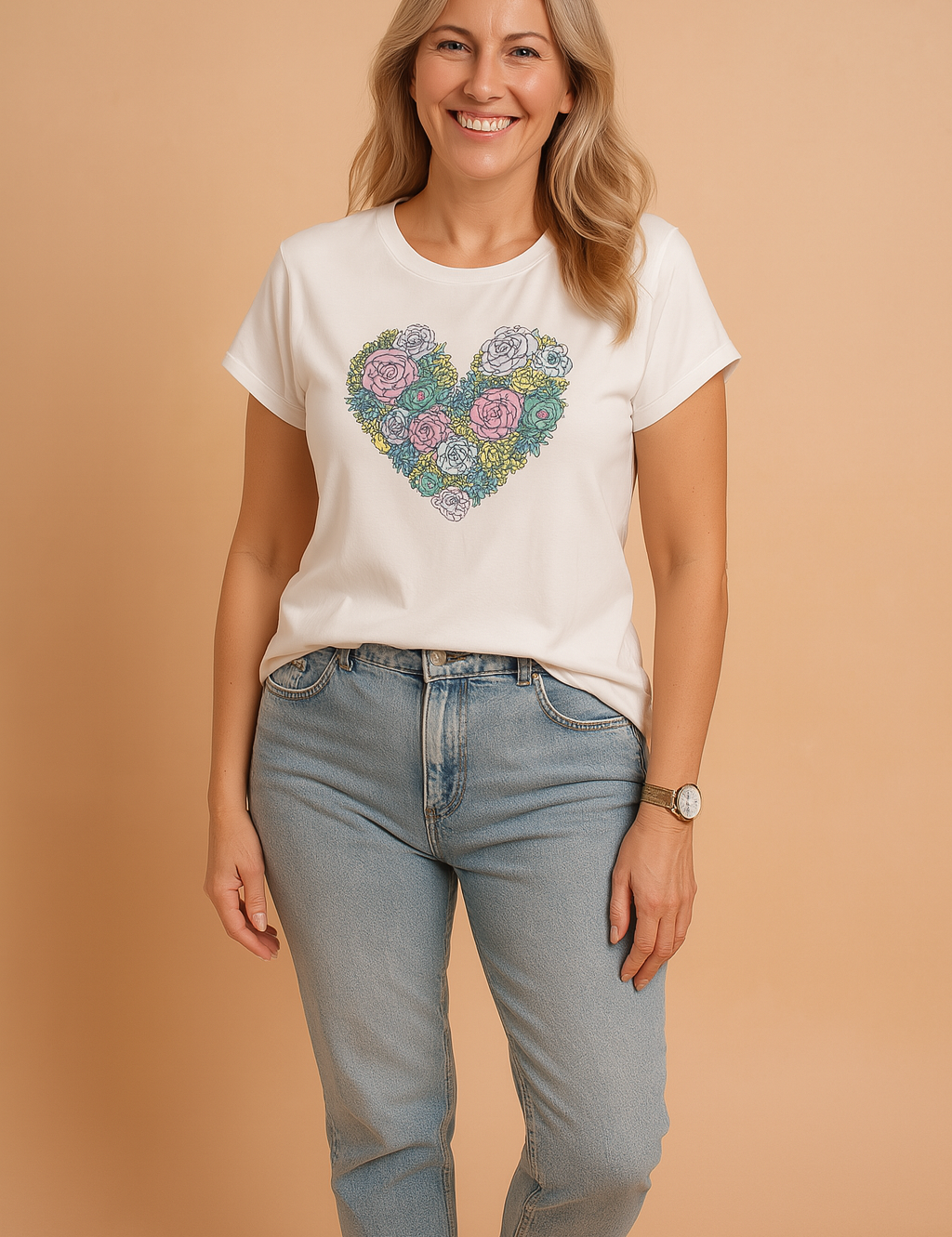 White fitted T-shirt with a colorful heart-shaped succulent and floral print, paired with high-waisted light blue denim jeans.