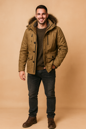 Khaki winter parka jacket with fur-trimmed hood, button and zipper closure, and multiple front pockets, designed for warmth and style.