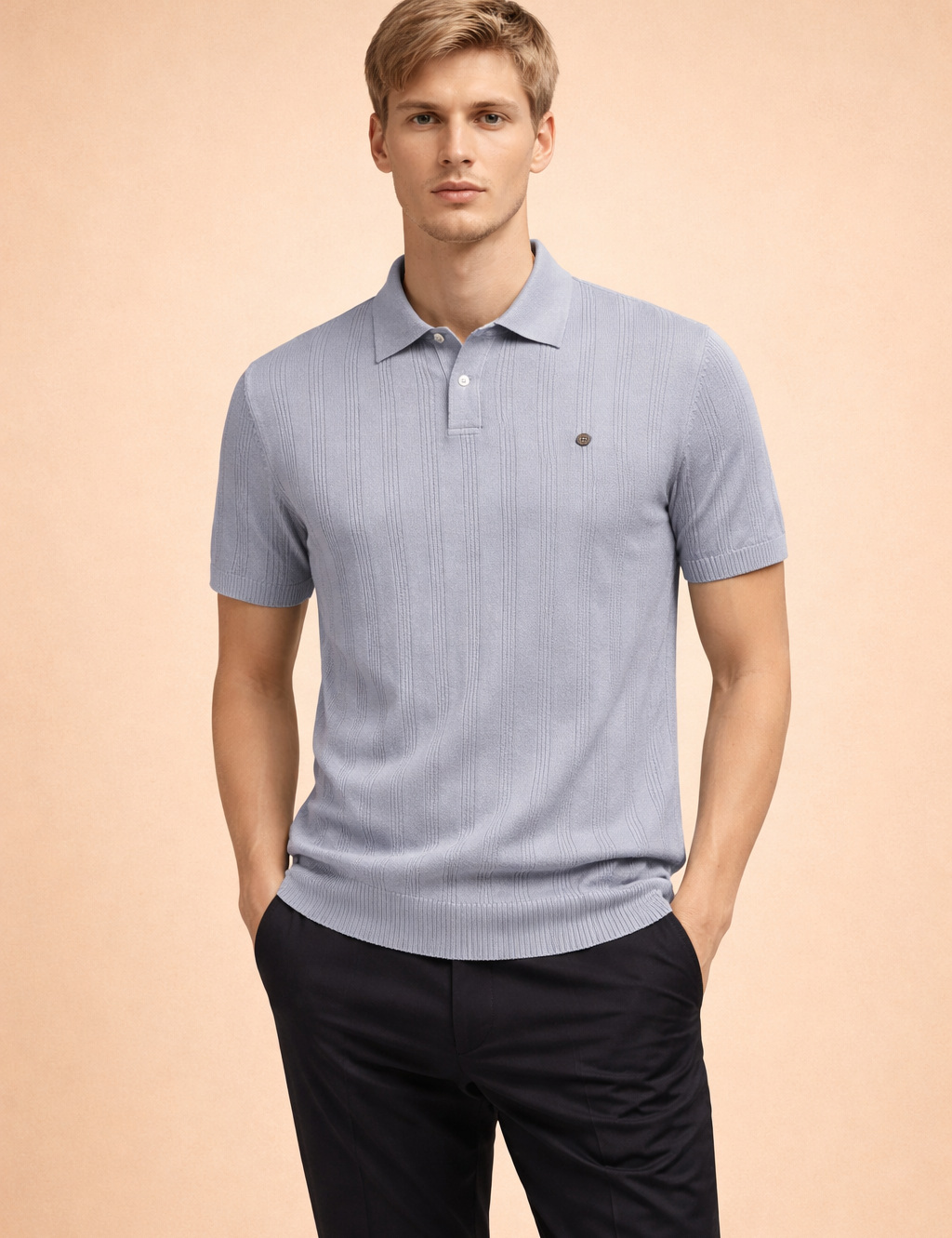 Light blue short-sleeve polo shirt with a structured collar, two-button placket, refined vertical rib texture, clean hem finish, and subtle chest emblem, paired with tailored straight-leg trousers for a polished smart-casual look.