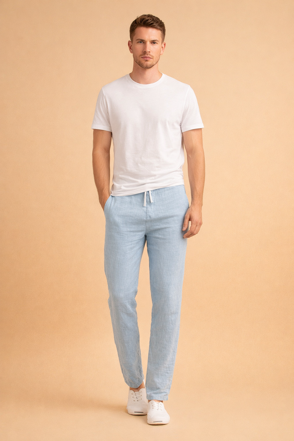 Light blue linen drawstring trousers with a straight slim leg, lightweight breathable fabric, smooth weave texture, clean waistband with adjustable tie, ankle-length cut, paired with minimalist white low-top sneakers.