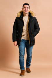 Men’s winter parka in black with faux fur trim and golden fleece lining, featuring a hood, buttoned flap pockets, and a zip closure for stylish warmth.