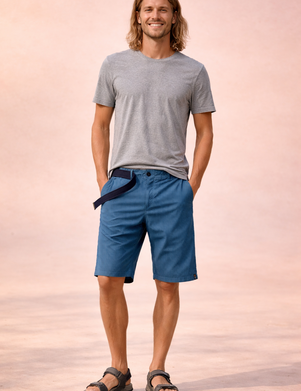 Men’s lightweight outdoor shorts in deep blue with a fine micro-check woven texture, breathable fabric construction, mid-thigh straight cut, zip fly with single button closure, integrated black webbing belt, clean finished hem, and durable casual utility design.
