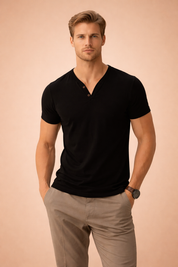 Men’s fitted short-sleeve Henley T-shirt with a clean V-neck opening, three-button placket, tailored athletic cut, smooth fabric drape, and minimal modern finish for everyday wear.
