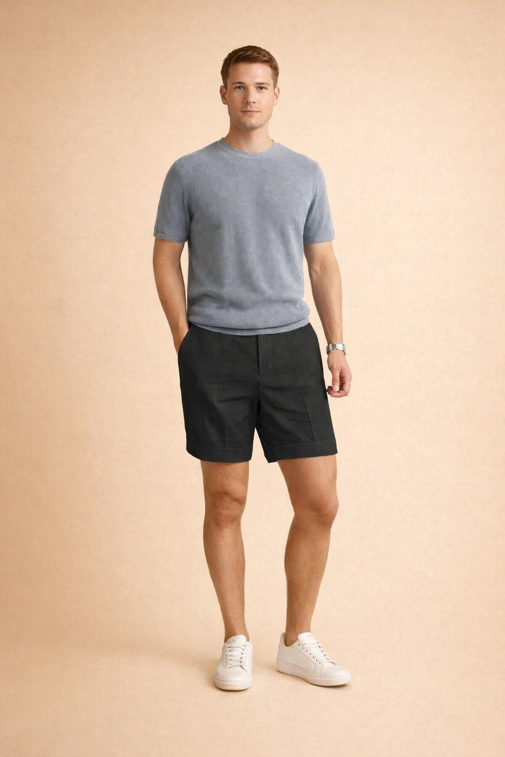 Light beige men’s tailored linen shorts featuring a breathable woven texture, smooth matte finish, clean front seam, mid-thigh length, straight hem, and minimal casual cut designed for warm-weather comfort and relaxed elegance.