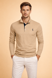 Men’s long-sleeve polo top with a clean structured fit, classic button placket, refined collar shape, and a minimal embroidered chest detail, styled with tailored straight-leg trousers for a polished modern look.
