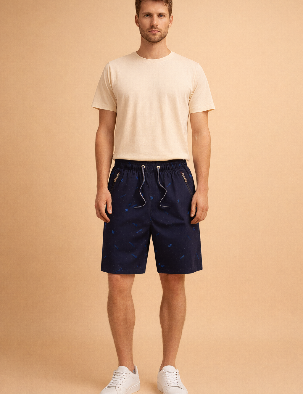 Navy blue men’s casual summer shorts with subtle all over micro dot pattern and small tonal graphic motifs, elastic waistband with drawstring, mid length relaxed fit, lightweight breathable fabric, zippered side pockets, smooth matte finish, tailored casual silhouette