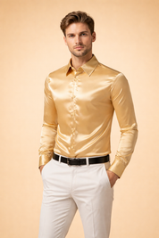 Luxurious satin long-sleeve men’s button-up shirt with a smooth glossy finish, structured pointed collar, front button closure, tailored slim silhouette, and clean cuffs styled with classic white tailored trousers and a sleek belt.