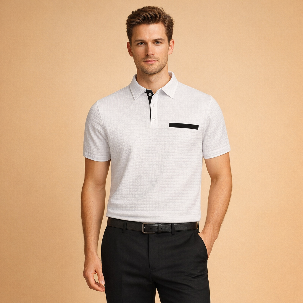 Structured short-sleeve men’s polo shirt with subtle textured pattern, button placket with contrast trim, minimalist chest detail, paired with tailored straight-leg trousers for a clean modern look.