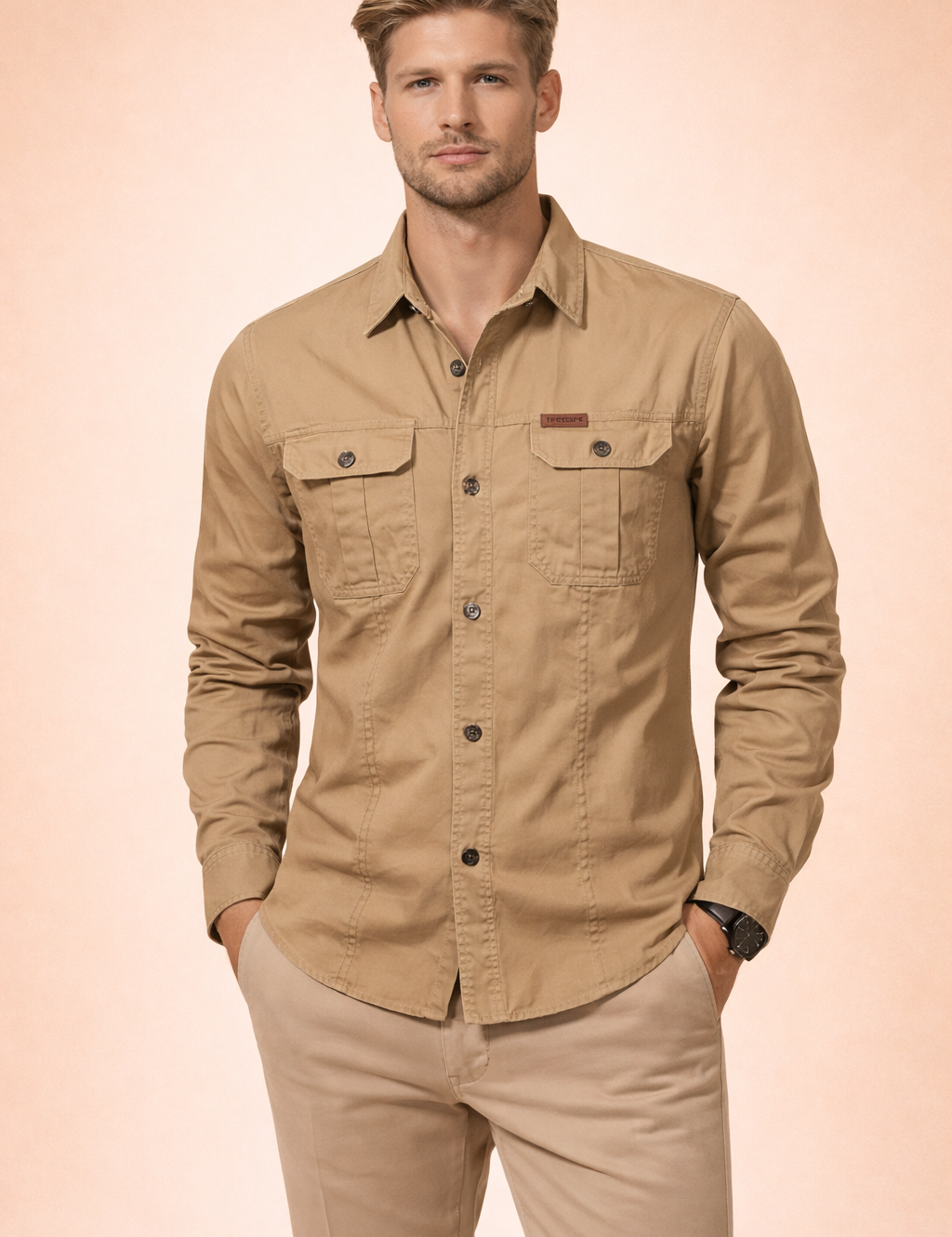 Long-sleeve button-up utility shirt with a structured collar, dual chest flap pockets, button-front closure, clean tailored fit, reinforced seams, and a refined rugged silhouette suitable for smart-casual and outdoor-inspired styling.
