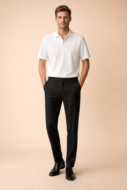 Minimalist men’s two-piece outfit featuring a crisp white short-sleeve button shirt with a smooth, clean weave paired with tailored black trousers in a refined matte fabric, finished with classic black leather dress shoes for a timeless smart-casual look.