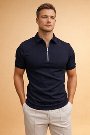 Slim-fit short-sleeve zip-collar top with a clean polo-style neckline, smooth structured fabric, and a straight hem, paired with tailored drawstring trousers featuring a clean front seam and a relaxed yet refined silhouette