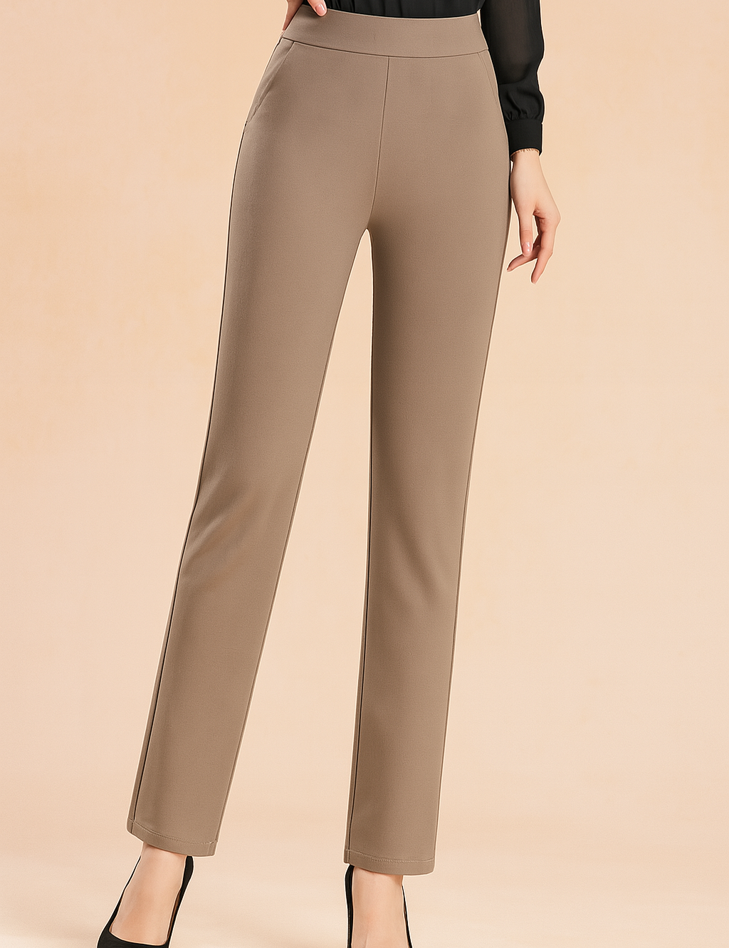 High-waisted taupe straight-leg trousers with a smooth waistband and tailored silhouette, paired with black pointed-toe heels for a refined, professional look.