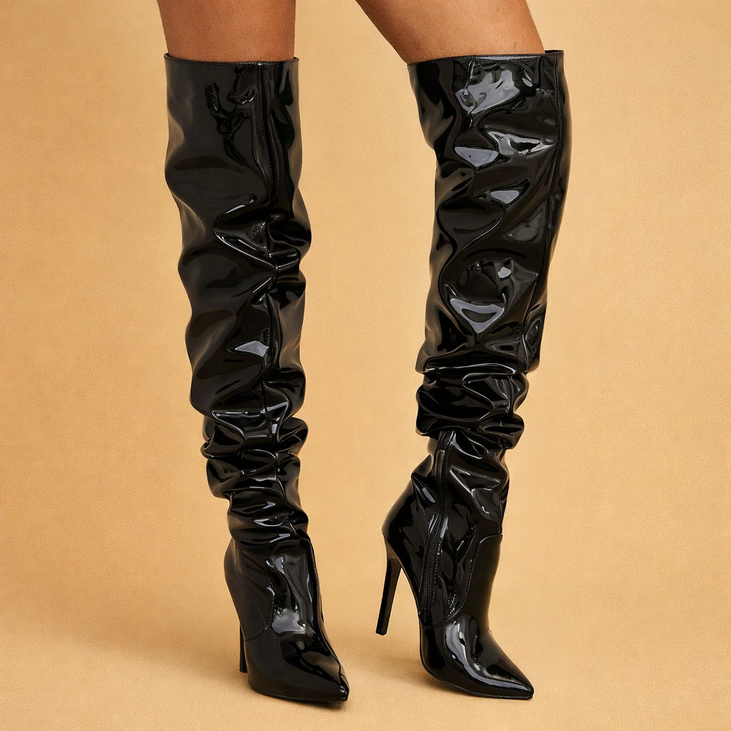 model-wearing-over-the-knee-boots-posed-studio-shot-luxury-fashion-editorial.png
