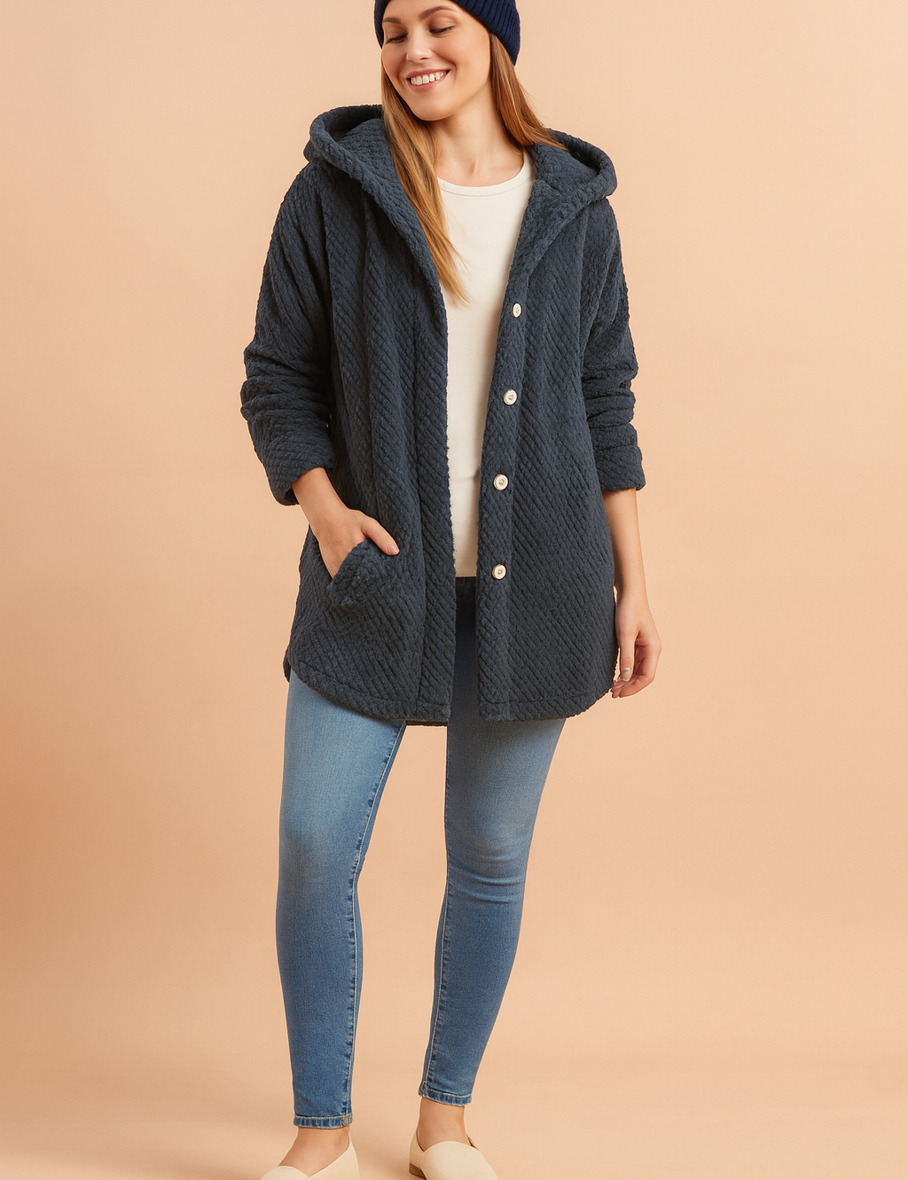 Dark navy hooded button-down winter jacket with textured quilted fabric, long sleeves, front pockets, and relaxed fit for casual comfort.