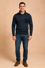 Navy quarter-zip men’s sweater with black shoulder panels and a black chest pocket, crafted in fine ribbed knit texture for a modern and stylish look.