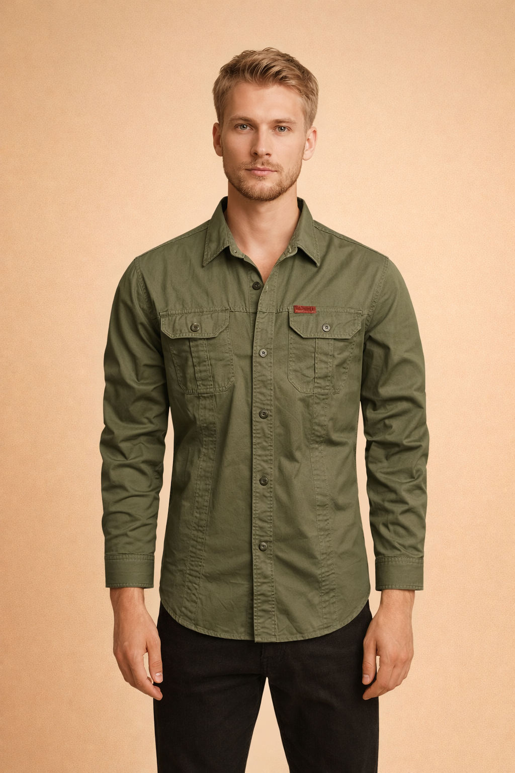 Olive green long-sleeve button-up shirt with structured collar, full front button closure, dual chest flap pockets with button fastening, tailored fit, and clean stitched seams for a sharp casual look.