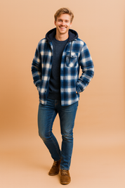 Blue and white plaid hooded jacket with button front closure, single chest pocket, and quilted inner lining, paired with slim blue jeans and brown suede shoes.