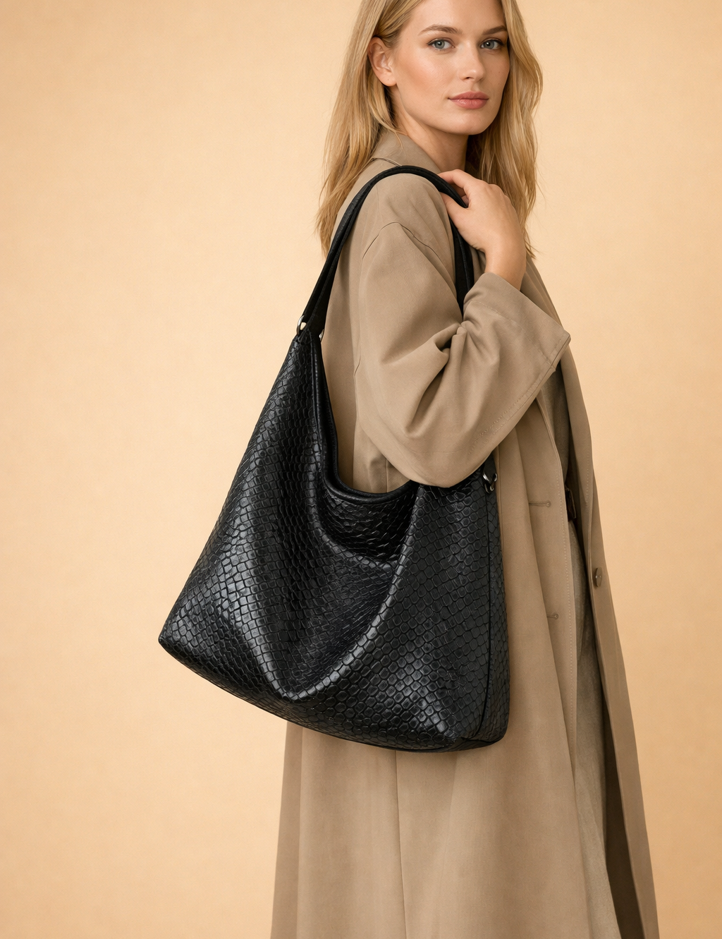 polish-fashion-model-wearing-black-leather-hobo-bag-studio-pose.png