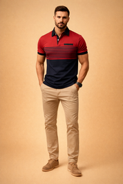 Modern men’s short-sleeve polo shirt in deep red and navy color-block design with fine horizontal chest stripes, black collar and sleeve cuffs, paired with tailored beige slim-fit chinos for a clean smart-casual look