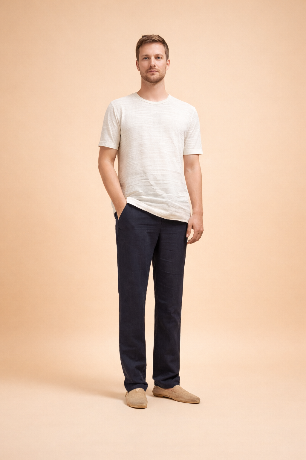 Men’s straight-leg tailored trousers with a clean minimalist cut, smooth structured drape, full-length legs, classic waistband with front pockets, and a refined modern silhouette suitable for everyday and smart-casual styling.