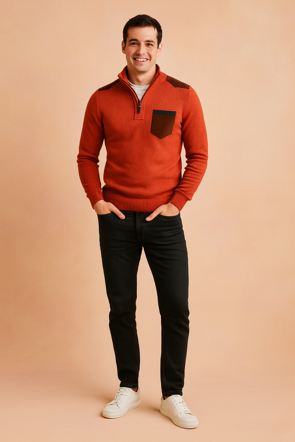 Men’s burnt orange quarter-zip sweater with brown shoulder accents and matching chest pocket detail, styled with slim-fit black jeans and white sneakers.