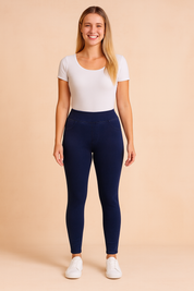 Navy blue jeggings with high-waisted design, sleek slim-fit cut, and smooth stretch fabric for a flattering silhouette.