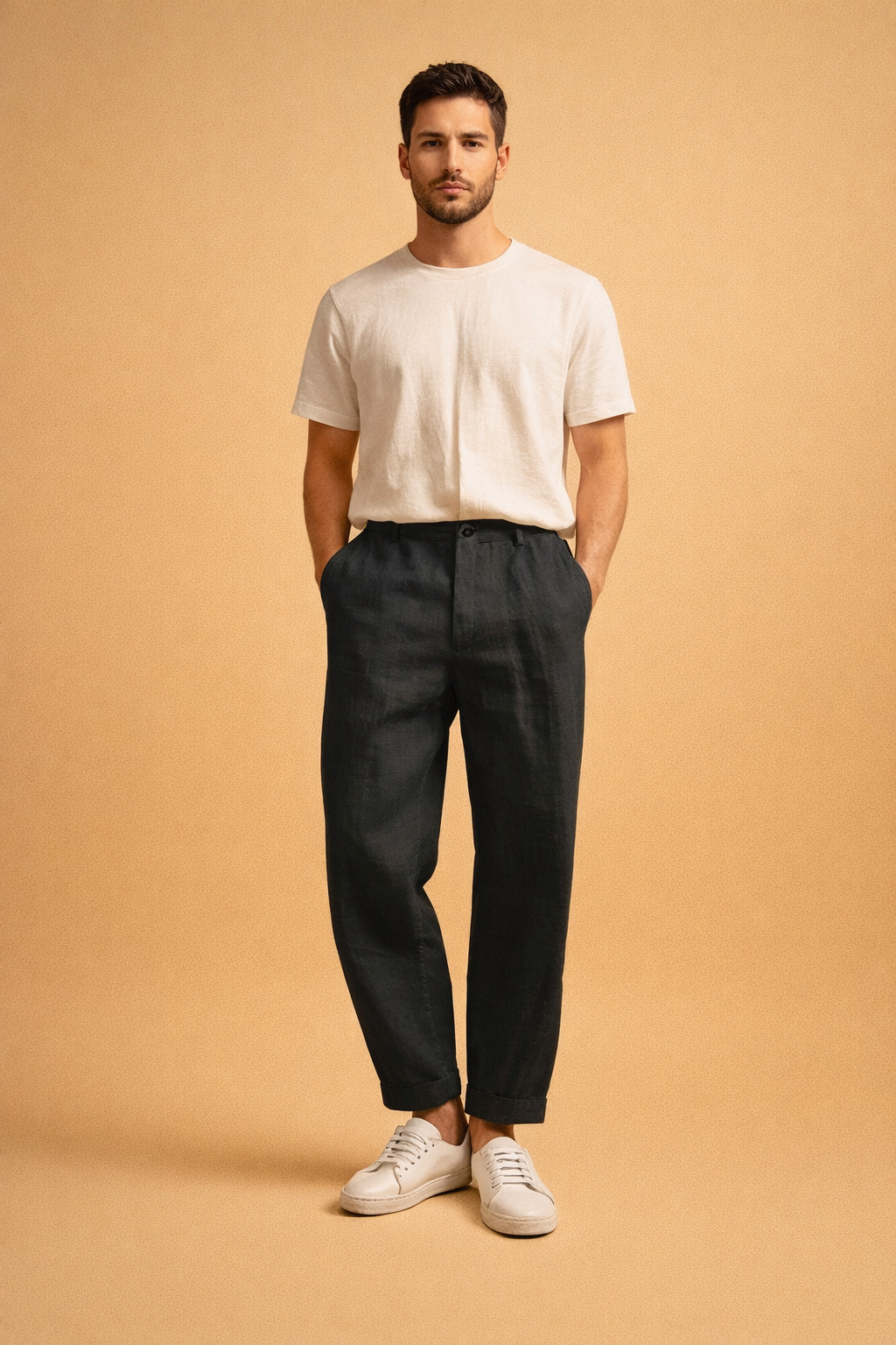 Men’s tailored white trousers with a clean straight-leg cut, flat front waistband, belt loops, front pockets, ankle-length finish, styled with minimal low-profile white sneakers for a refined modern look.