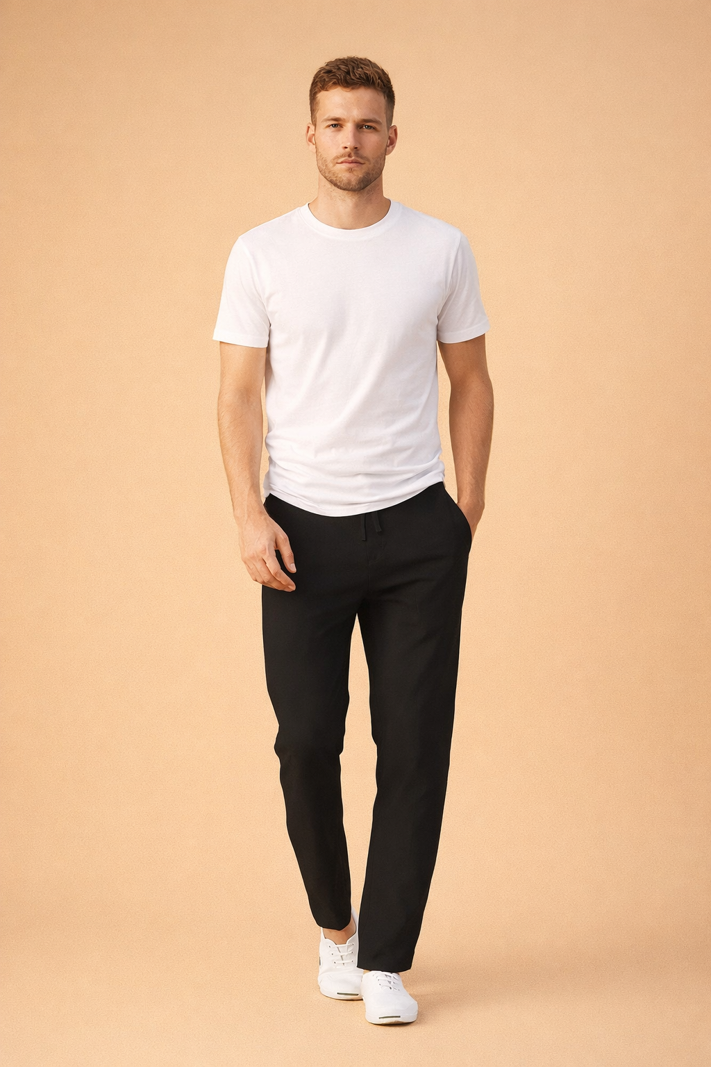 Slim-fit black tailored trousers with clean straight legs, smooth structured drape, flat front waistband, subtle front pockets, and a refined minimalist finish styled for a modern smart-casual look.