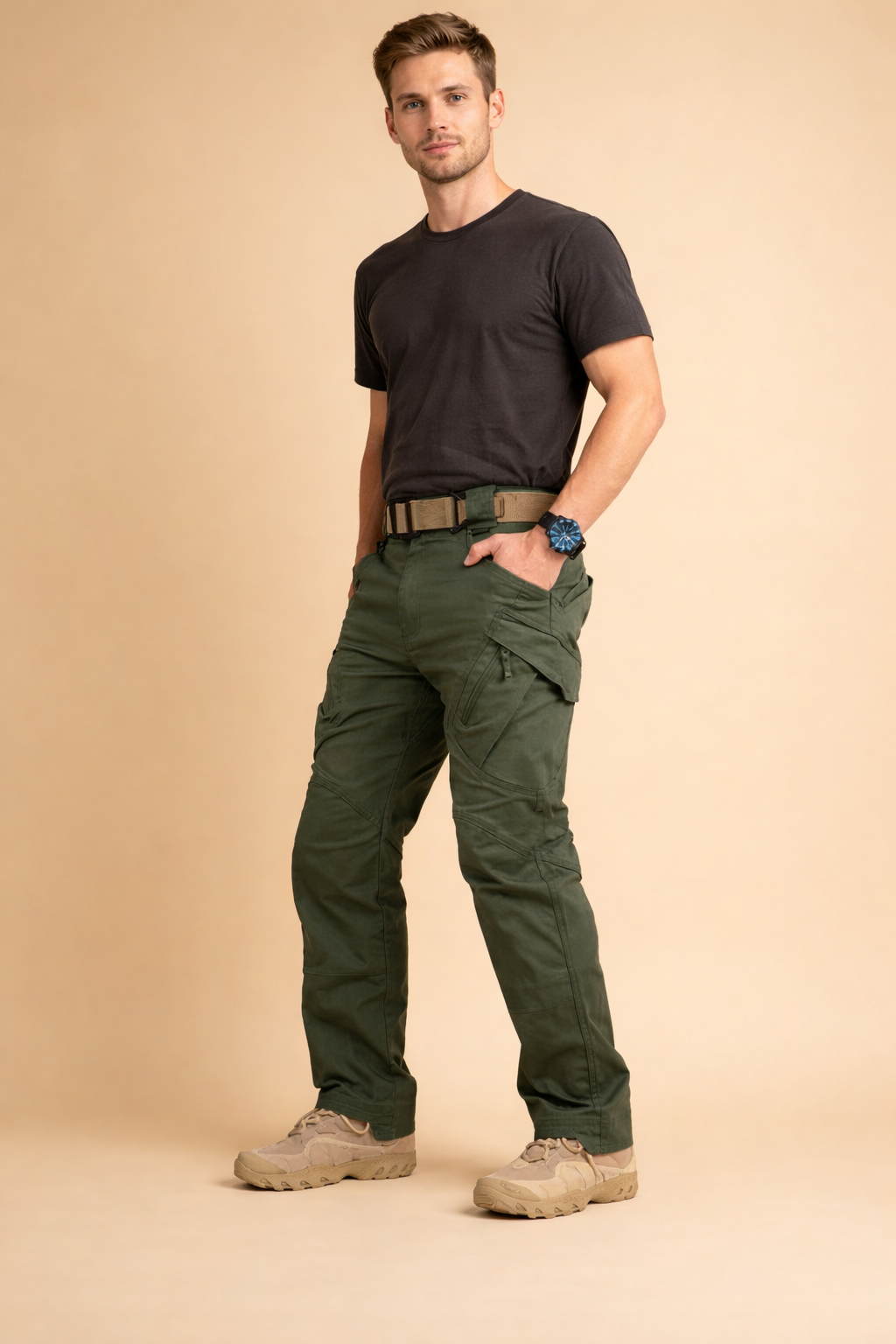 Structured tactical cargo pants with articulated knees, angled thigh pockets with flap and zipper detailing, straight-leg cut, reinforced seams, and a clean utility finish styled with a fitted short-sleeve top and lace-up outdoor boots.