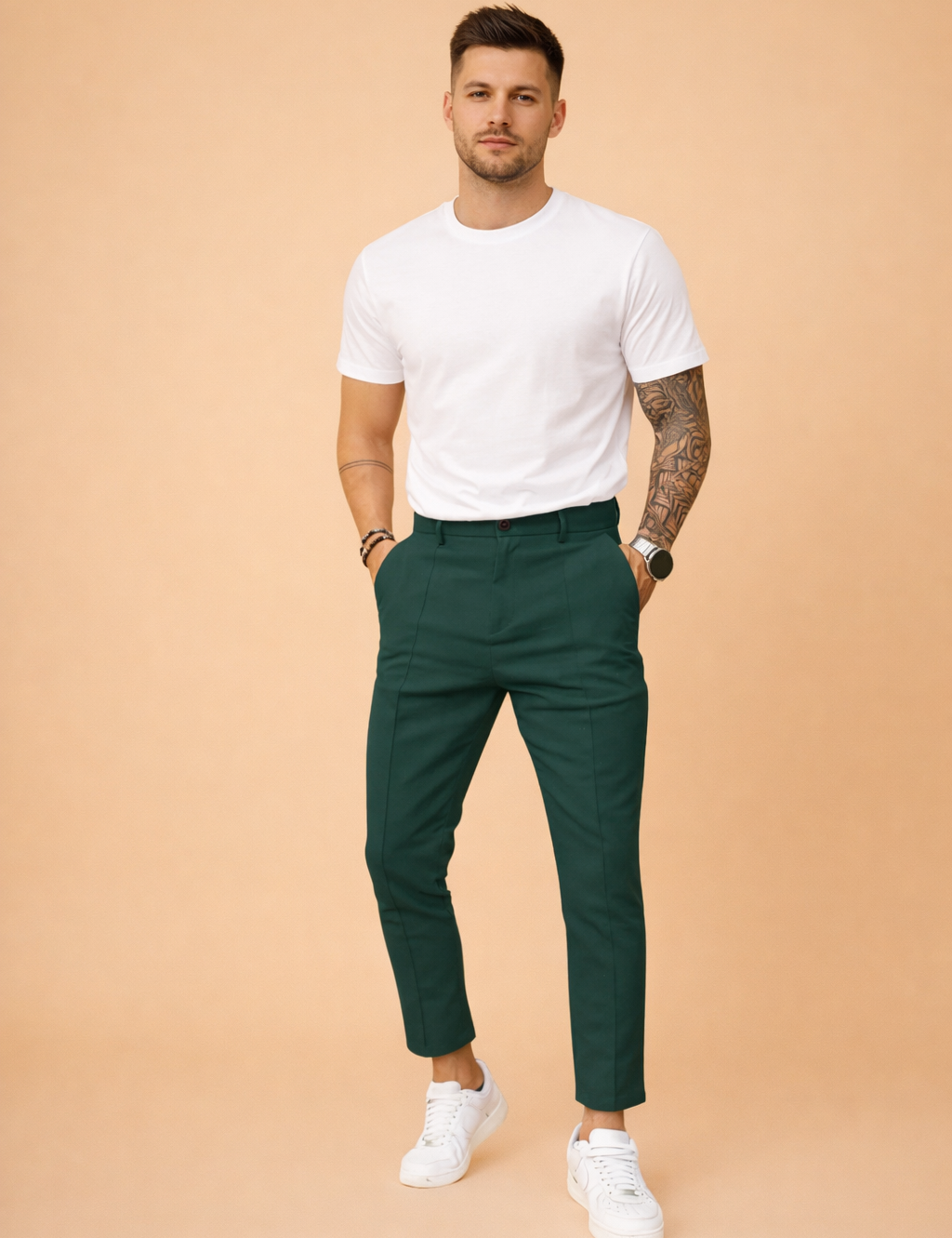 Tailored slim-fit trousers styled with a clean short-sleeve top and minimalist low-profile sneakers, creating a modern smart-casual outfit with a refined, structured silhouette.