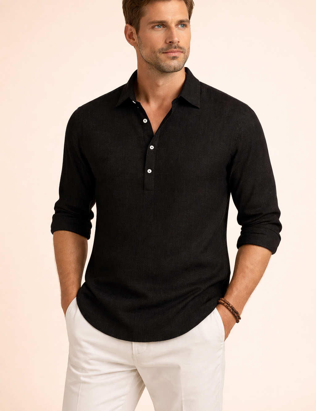 Long-sleeve relaxed-fit button-front shirt with a soft textured weave, open collar neckline, clean placket with contrast buttons, gently rolled cuffs, and a smooth drape designed for an effortless modern silhouette.