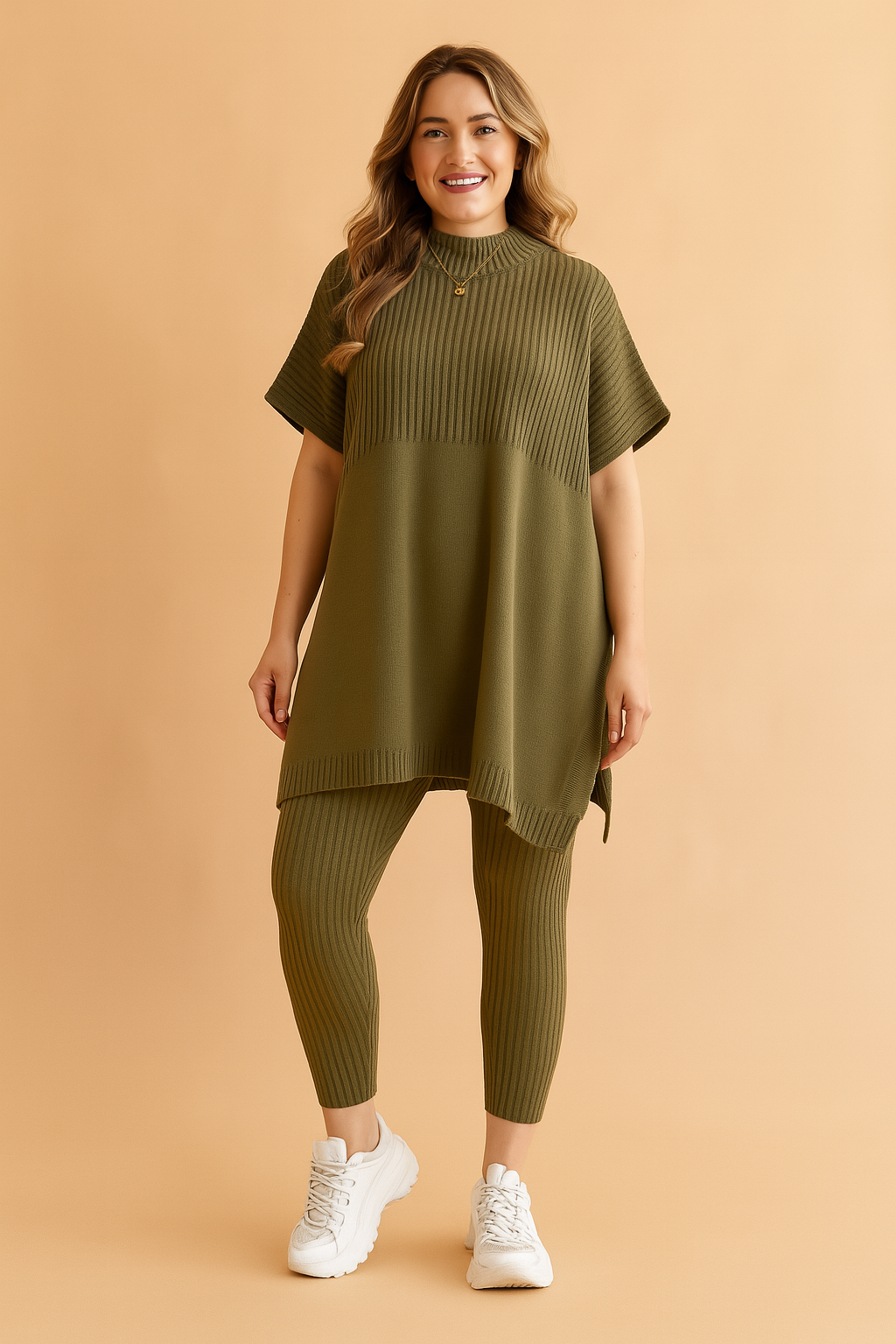 Two-piece ribbed knit co-ord set featuring an oversized short-sleeve tunic and matching fitted leggings in deep olive green, styled with side slits and a high neckline for casual comfort.