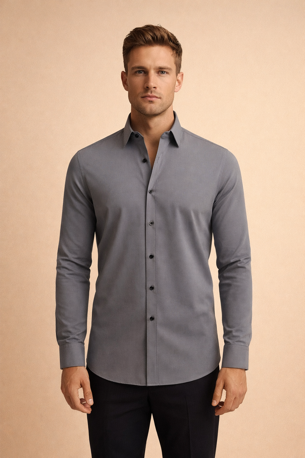 Slim-fit long-sleeve button-down shirt with a structured collar, smooth tailored silhouette, clean front placket, and refined cuffs designed for a modern, polished look.
