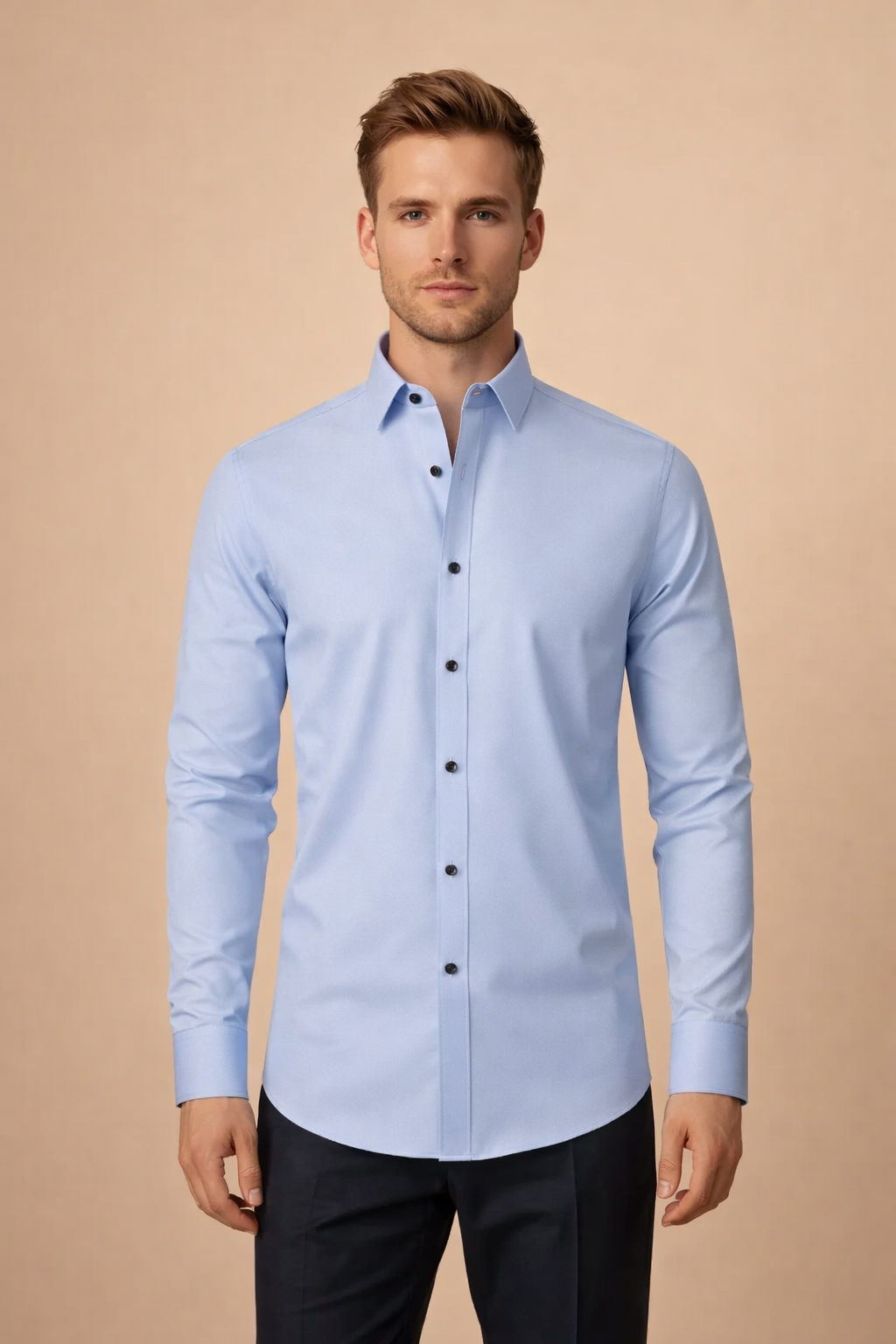 Slim-fit long-sleeve button-down shirt with a clean spread collar, smooth woven texture, tailored silhouette, and contrasting dark buttons for a refined formal look.